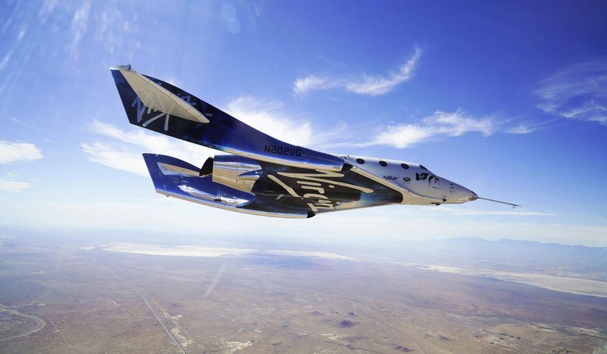 This May 29, 2018 photo provided by Virgin Galactic shows the VSS Unity craft during a supersonic flight test. The spaceship isn’t launched from the ground but is carried beneath a special aircraft to an altitude around 50,000 feet (15,240 meters). There, it’s released before igniting its rocket engine and climbing. (Virgin Galactic via AP)