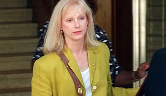 FILE - In this Sept. 11, 1996 file photo, Sondra Locke leaves court in Burbank, Calif., after opening statements in a civil suit against Locke&#39;s former live-in boyfriend, Clint Eastwood. The Oscar-nominated actress Locke has died. A death certificate obtained by The Associated Press shows Locke died Nov. 3, 2018, at age 74 at her home in Los Angeles of cardiac arrest stemming from breast and bone cancer. (AP Photo/John Hayes, File)