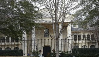 This photo taken Thursday, Dec. 13, 2018 shows the home of Leonid Teyf and wife Tatyana in Raleigh, N.C. Federal prosecutors say the couple used a kickback scheme to defraud the Russian government and fund a lavish lifestyle. Leonid Teyf is accused of money laundering and murder-for-hire, among other charges. His wife and three others face charges ranging from money laundering to immigration fraud. (AP Photo/Gerry Broome)