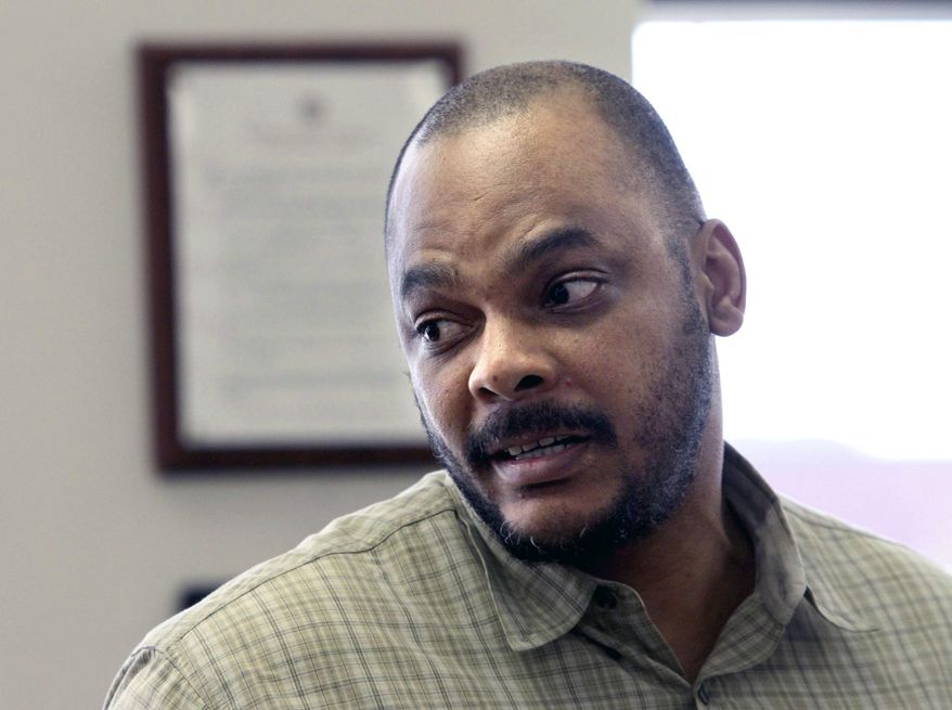 FILE - In this June 17, 2011 file photo Dorcus Allen addresses the court prior to his sentencing at the County-City Building in Tacoma, Wash. The Washington Supreme Court has ruled that Allen, who drove Lakewood police killer Maurice Clemmons to and from the scene where he gunned down four officers in 2009, will not face aggravated murder charges at his retrial. At his first trial, jurors convicted Allen of first-degree murder, but they did not find him guilty of aggravating factors that would lead to an automatic sentence of life in prison without release. (Janet Jensen/The News Tribune via AP, File)