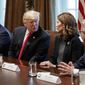President Donald Trump speaks to Gov.-elect Kristi Noem, R-S.D., during a meeting with newly elected governors in the Cabinet Room of the White House, Thursday, Dec. 13, 2018, in Washington. From left, Gov.-elect J.B. Pritzker, D-Ill., Gov.-elect Ron DeSantis, R-Fla., Trump, Noem, and Gov.-elect Mike DeWine, R-Ohio. (AP Photo/Evan Vucci)
