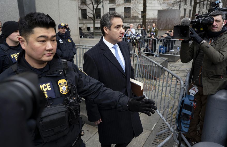 In this Dec. 12, 2018, photo, Michael Cohen, President Donald Trump&#39;s former lawyer, leaves federal court after his sentencing in New York. Trump has gone from denying knowledge of any payments to women who claim to have been mistresses to apparent acknowledgement of those hush money settlements – though he claims they wouldn&#39;t be illegal.  (AP Photo/Craig Ruttle)