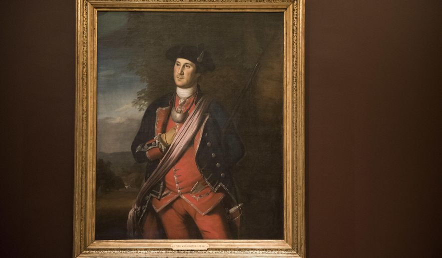 On loan from Washington & Lee University, the earliest known portrait of George Washington, painted by Charles Willson Peale in 1772, is installed at the Donald W. Reynolds Museum on Thursday, Dec. 13, 2018 in Mount Vernon, Va. (AP Photo/Kevin Wolf)