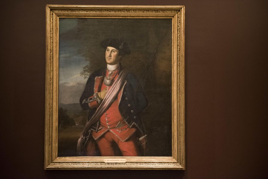 On loan from Washington & Lee University, the earliest known portrait of George Washington, painted by Charles Willson Peale in 1772, is installed at the Donald W. Reynolds Museum on Thursday, Dec. 13, 2018 in Mount Vernon, Va. (AP Photo/Kevin Wolf)