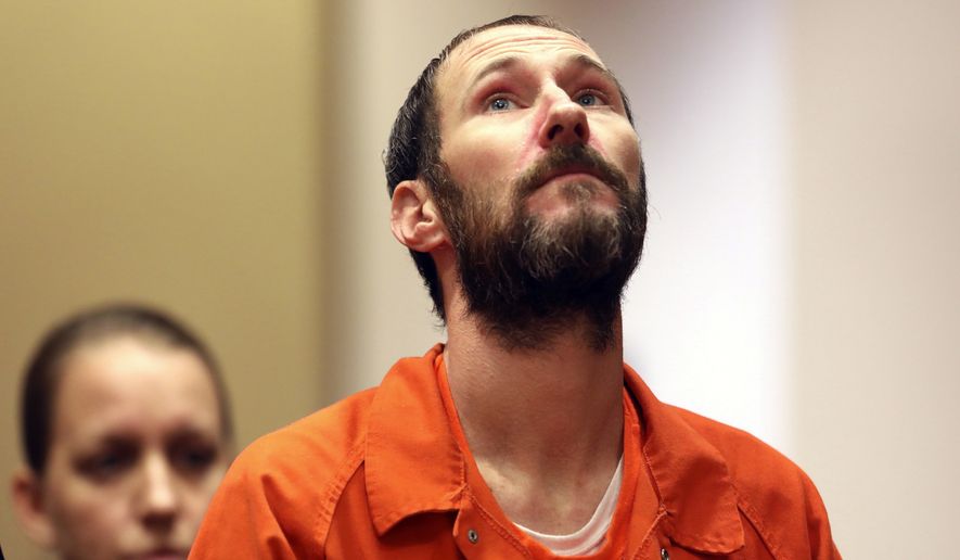 Johnny Bobbitt stands during a hearing Burlington County Courthouse in Mt. Holly, N.J. on Friday Dec. 14, 2018. Bobbitt will be released from county jail and live in his apartment in Philadelphia. Prosecutors say Bobbitt conspired with Katelyn McClure and her former boyfriend, Mark D'Amico, to concoct a feel-good story about Bobbitt giving McClure his last $20 when her car ran out of gas. They raised $400,000, which authorities say was spent on luxury items and casino trips. (David Swanson /The Philadelphia Inquirer via AP, Pool) **FILE**