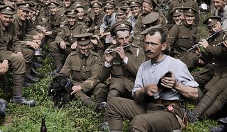 This image released by Warner Bros. Entertainment shows a scene from the WWI documentary &amp;quot;They Shall Not Grow Old,&amp;quot; directed by Peter Jackson. Jackson drew on all the technical know-how of his big-budget spectacles to turn hundreds of hours of footage from the Western Front and audio of surviving soldiers into a seamless, unobstructed portrait of the war as seen from the British trenches. Jackson altered frame rates, colorized and turned 3-D the footage, even employing lip readers to capture dialogue.  (Warner Bros. Entertainment via AP)