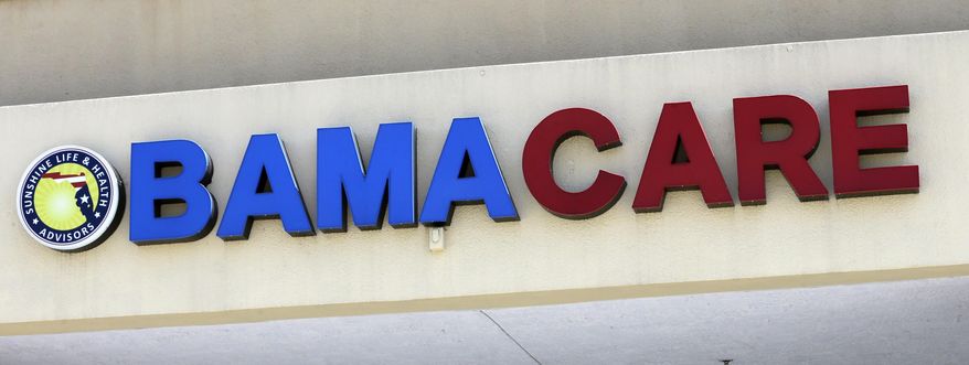 This May 11, 2017, file photo shows an Obamacare sign being displayed on the storefront of an insurance agency in Hialeah, Fla. (AP Photo/Alan Diaz, File)