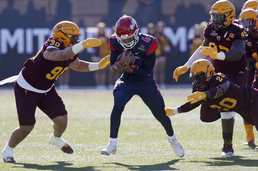 Fresno State quarterback Marcus McMaryion (6) runs for a gain against Arizona State during the first half of the Las Vegas Bowl NCAA college football game, Saturday, Dec. 15, 2018, in Las Vegas. (AP Photo/John Locher)
