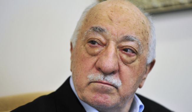FILE - In this July 2016 file photo, Islamic cleric Fethullah Gulen speaks to members of the media at his compound, in Saylorsburg, Pa. Turkey on Sunday dismissed as &quot;ludicrous and groundless&quot; a report that Turkish officials may have discussed kidnapping Gulen, a U.S.-based Muslim cleric, in exchange for millions of dollars. (AP Photo/Chris Post, File)