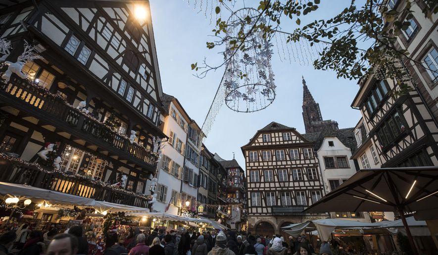 People once against in the streets as Strasbourg&#x27;s Christmas market reopens under the protection of police, in Strasbourg, France, Saturday Dec. 15, 2018. French police shot and killed the man who they believed attacked Strasbourg&#x27;s Christmas market on Tuesday killing four people.  (AP Photo/Jean-Francois Badias)