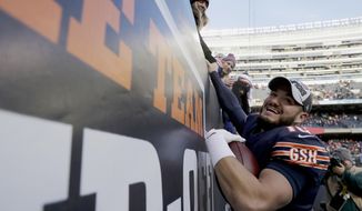 Chicago Bears quarterback Mitchell Trubisky (10) celebrates with fans after an NFL football game against the Green Bay Packers Sunday, Dec. 16, 2018, in Chicago. The Bears won 24-17. (AP Photo/Nam Y. Huh)