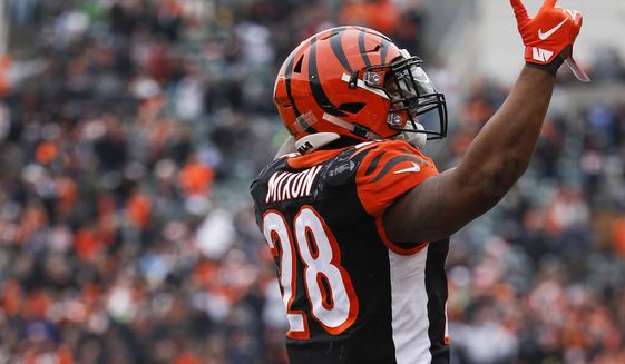 Cincinnati Bengals running back Joe Mixon celebrates his touchdown in the first half of an NFL football game against the Oakland Raiders, Sunday, Dec. 16, 2018, in Cincinnati. (AP Photo/Frank Victores)