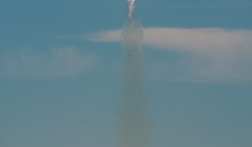 In this photo provided by the U.S. Air Force, a SpaceX Falcon 9 rocket, carrying the Spaceflight SSO-A: SmallSat Express, launches from Space Launch Complex-4E at Vandenberg Air Force Base, Calif., Monday, Dec. 3, 2018. The SpaceX rocket carrying 64 small satellites, marks the first time the same Falcon 9 rocket has been used in three space missions. (Michael Peterson/U.S. Air Force via AP) (ASSOCIATED PRESS PHOTOGRAPHS)