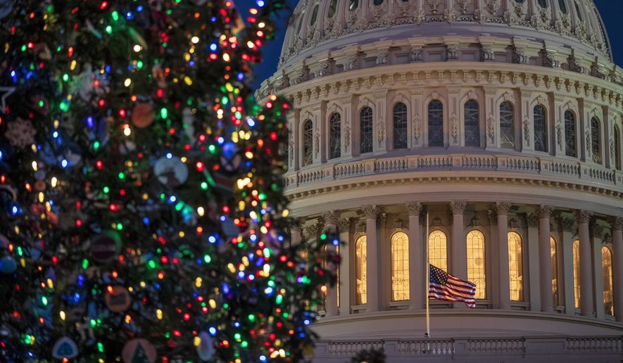 The Capitol is seen at twilight in Washington, Monday, Dec. 17, 2018. The fight over President Donald Trump&#x27;s $5 billion wall funds deepened Monday, threatening a partial government shutdown in a standoff that has become increasingly common in Washington. (AP Photo/J. Scott Applewhite)