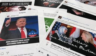Some of the Facebook and Instagram ads linked to a Russian effort to disrupt the American political process and stir up tensions around divisive social issues, released by members of the U.S. House Intelligence committee, are photographed in Washington, on Wednesday, Nov. 1, 2017. (AP Photo/Jon Elswick)