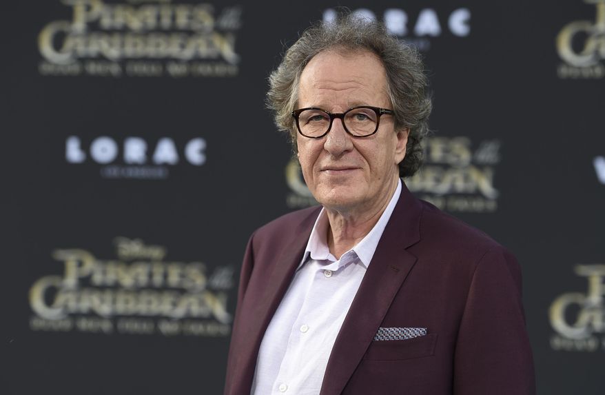 In this May 18, 2017, file photo, Geoffrey Rush arrives at the Los Angeles premiere of "Pirates of the Caribbean: Dead Men Tell No Tales" at the Dolby Theatre. “Orange Is the New Black” actress Yael Stone alleges Rush engaged in sexually inappropriate behavior when they starred in “The Diary of a Madman” in 2010. (Photo by Jordan Strauss/Invision/AP, File)