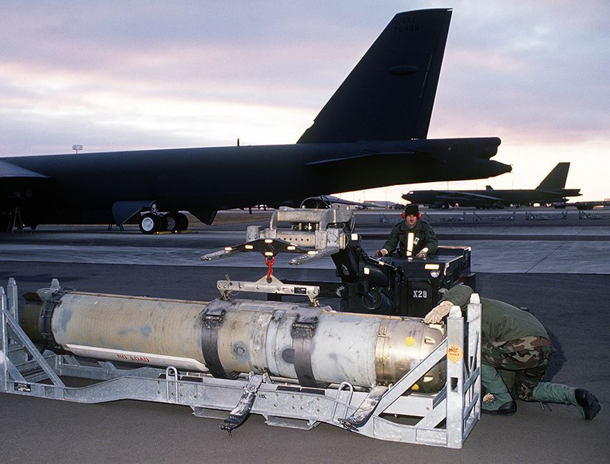 MARK 60 CAPTOR - Airmen from the 42nd Munitions Maintenance Squadron prepare to load a Mark 60 CAPTOR (encapsulated torpedo) anti-submarine mine onto a 42nd Bombardment Wing B-52G Stratofortress aircraft during Ghost Warrior, a joint Air Force/Navy exercise conducted during the base&#39;s conventional operational readiness inspection.