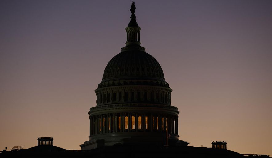 The U.S. Capitol Building Dome is seen before the sun rises in Washington, Tuesday, Dec. 18, 2018. (AP Photo/Carolyn Kaster)