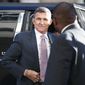 President Donald Trump&#39;s former National Security Adviser Michael Flynn arrives at federal court in Washington, Tuesday, Dec. 18, 2018. (AP Photo/Carolyn Kaster)
