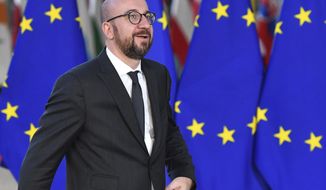 FILE - In this file photo dated Thursday, Dec. 13, 2018, Belgian Prime Minister Charles Michel arrives for an EU summit in Brussels.  Belgian Prime Minister Charles Michel has announced his resignation in address at parliament, Tuesday, Dec. 18, 2018, and says he will notify the king. (AP Photo/Geert Vanden Wijngaert, FILE)