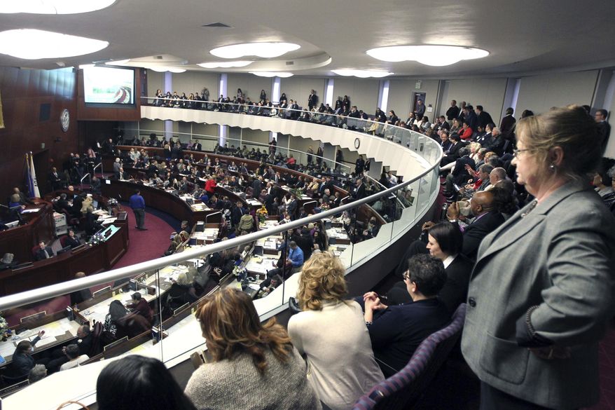In this Feb 6, 2017, file photo, spectators look watch the Nevada State Assembly on the opening day of the Legislative Session in Carson City, Nev. Nevada became the first state in the U.S. with an overall female-majority in the Legislature on Tuesday, Dec. 18, 2018, when county officials in Las Vegas appointed two women to fill vacancies in the state Assembly. (AP Photo/Lance Iversen, File)