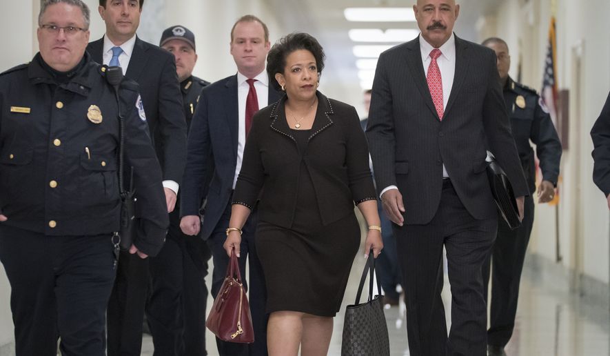 Former Attorney General Loretta Lynch arrives on Capitol Hill in Washington, Wednesday, Dec. 19, 2018, to appear before the GOP-led House Judiciary and Oversight Committees in their probe of conduct by federal law enforcement officials in the investigation of President Trump&#39;s alleged Russia ties, and Hillary Clinton&#39;s emails. The panels also interviewed former FBI Director James Comey. (AP Photo/J. Scott Applewhite)
