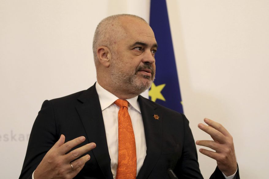 Prime Minister of Albania Edi Rama addresses the media during a press conference at the federal chancellery in Vienna, Austria, Monday, Nov. 19, 2018. (AP Photo/Ronald Zak) **FILE**

 