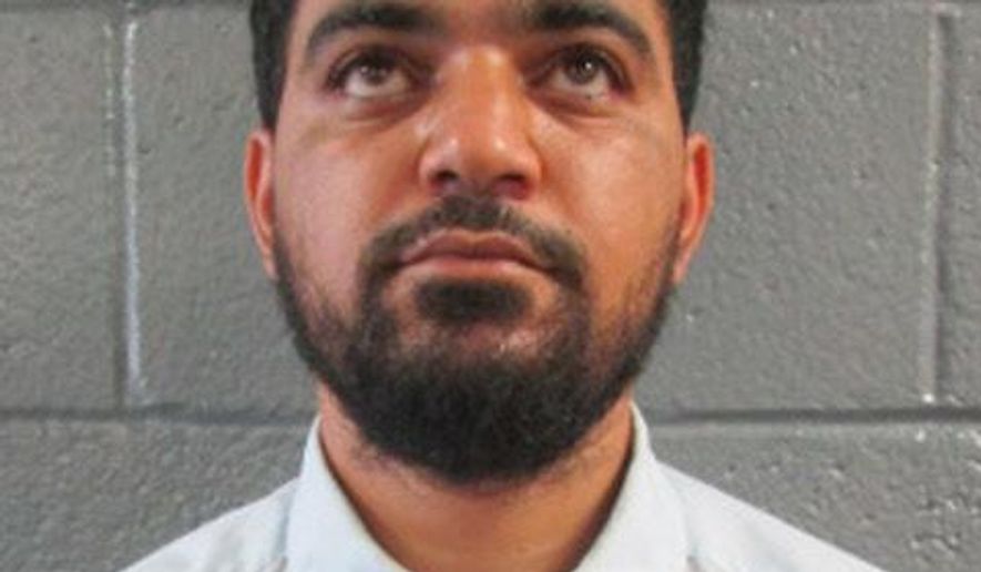 This undated file photo provided by the Arizona Department of Corrections shows Ahmad Suhad Ahmad, who was ordered to remain in jail until his trial on federal charges for allegedly showing undercover federal agents how to make explosive devices in two sting operations during 2017. Ahmad has pleaded not guilty to the charges. He previously served time in state prison on drug convictions. (Arizona Department of Corrections via AP, file)