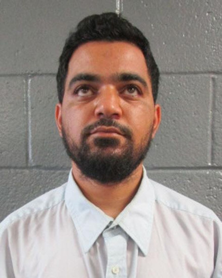This undated file photo provided by the Arizona Department of Corrections shows Ahmad Suhad Ahmad, who was ordered to remain in jail until his trial on federal charges for allegedly showing undercover federal agents how to make explosive devices in two sting operations during 2017. Ahmad has pleaded not guilty to the charges. He previously served time in state prison on drug convictions. (Arizona Department of Corrections via AP, file)