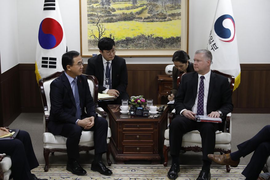 U.S. Special Representative for North Korea Stephen Biegun, right, talks with South Korean Unification Minister Cho Myoung-gyon, left, during a meeting at the Unification Ministry in Seoul, South Korea, Friday, Dec. 21, 2018. North Korea said Thursday it will never unilaterally give up its nuclear weapons unless the United States first removes what Pyongyang called a nuclear threat. (Kim Hong-Ji/Pool Photo via AP)