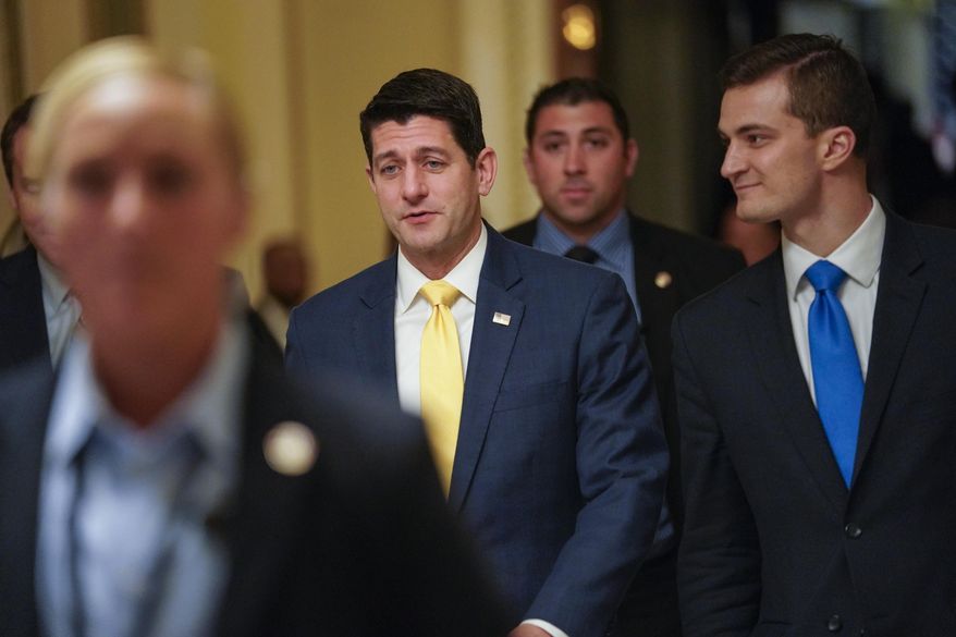 Speaker of the House Paul Ryan, R-Wis., leaves the House chamber as members try to pass legislation that would avert a partial government shutdown, at the Capitol in Washington, Thursday, Dec. 20, 2018. (AP Photo/J. Scott Applewhite)