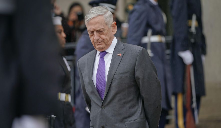 FILE - In this Nov. 9, 2018, file photo, Defense Secretary Jim Mattis waits outside the Pentagon. President Donald Trump says Mattis will be retiring at the end of February 2019 and that a new secretary will be named shortly. (AP Photo/Pablo Martinez Monsivais, File)
