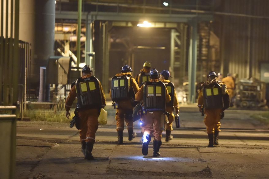 A rescue team is pictured at the CSM coal mime in Karvina, Czech Republic, Tursday, Dec. 20, 2018. The death toll in a methane explosion that hit the coal mine in northeast Czech Republic increased to 13, a mining company said Friday. (Jaroslav Ozana/CTK via AP)