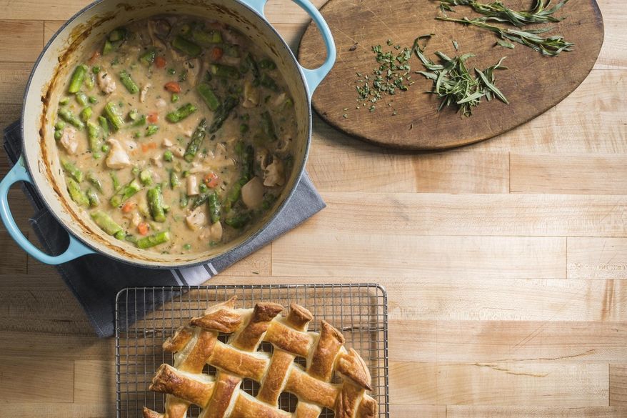 This undated photo provided by America's Test Kitchen in December 2018 shows Chicken Pot Pie in Brookline, Mass. This recipe appears in the book "Cook It In Your Dutch Oven." (Carl Tremblay/America's Test Kitchen via AP)