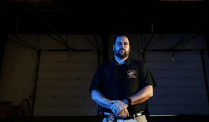 In this Thursday, Dec. 13, 2018, photo, Mesa County Sheriff's Department investigator Danny Norris, who was assigned as the lead investigator in the Sept. 2018 shooting death of Brandon Sanchez, is shown in Grand Junction, Colo. Colorado's "Make My Day" law gives people the right to use deadly force against intruders into their home whom they believe might hurt them. The question of who was the intruder and who lived in the house on Chipeta Avenue where Sanchez, 26, a Grand Junction resident was shot, was not clear-cut. (Chancey Bush/The Grand Junction Daily Sentinel via AP)
