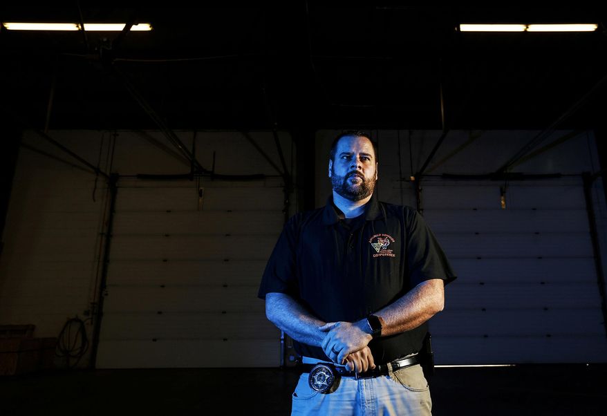 In this Thursday, Dec. 13, 2018, photo, Mesa County Sheriff's Department investigator Danny Norris, who was assigned as the lead investigator in the Sept. 2018 shooting death of Brandon Sanchez, is shown in Grand Junction, Colo. Colorado's "Make My Day" law gives people the right to use deadly force against intruders into their home whom they believe might hurt them. The question of who was the intruder and who lived in the house on Chipeta Avenue where Sanchez, 26, a Grand Junction resident was shot, was not clear-cut. (Chancey Bush/The Grand Junction Daily Sentinel via AP)