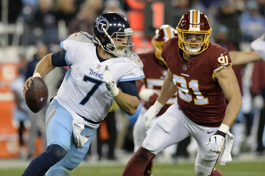 Tennessee Titans quarterback Blaine Gabbert (7) is pressured by Washington Redskins outside linebacker Ryan Kerrigan (91) in the second half of an NFL football game Saturday, Dec. 22, 2018, in Nashville, Tenn. (AP Photo/Mark Zaleski)