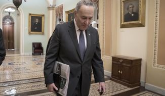 Senate Minority Leader Chuck Schumer, D-N.Y., arrives at the Capitol on the first morning of a partial government shutdown, as Democratic lawmakers, and some Republicans, are at odds with President Donald Trump on spending for his border wall, in Washington, Saturday, Dec. 22, 2018. (AP Photo/J. Scott Applewhite)