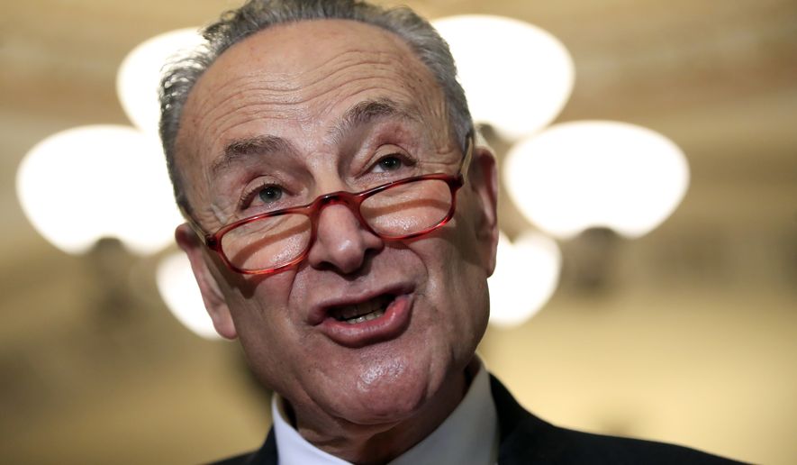 In this Dec. 11, 2018, file photo, Senate Minority Leader Chuck Schumer, D-N.Y., speaks to reporters on Capitol Hill in Washington. The White House on Sunday, Dec. 16, pushed the federal government closer to the brink of a partial shutdown later this week, digging in on its demand for $5 billion to build a border wall as congressional Democrats stood firm against it. Democratic congressional leaders, Schumer and Rep. Nancy Pelosi, have proposed no more than $1.6 billion, as outlined in a bipartisan Senate bill. The money would not go for the wall but for fencing upgrades and other border security. (AP Photo/Manuel Balce Ceneta, File)