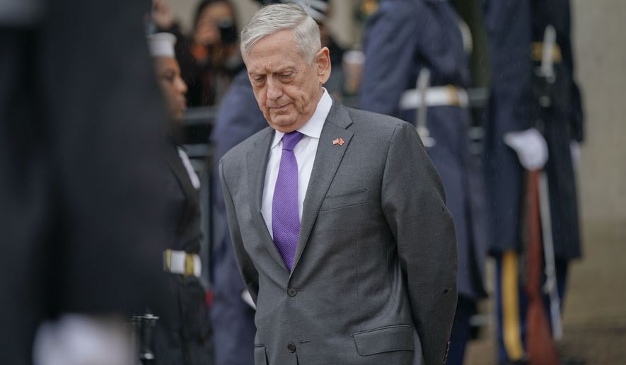 In this Nov. 9, 2018, file photo, Defense Secretary Jim Mattis waits outside the Pentagon. President Donald Trump says Mattis will be retiring at the end of February 2019 and that a new secretary will be named shortly. (AP Photo/Pablo Martinez Monsivais, File)