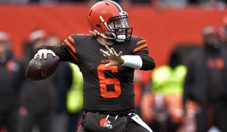 Cleveland Browns quarterback Baker Mayfield throws during the first half of an NFL football game against the Cincinnati Bengals, Sunday, Dec. 23, 2018, in Cleveland. (AP Photo/David Richard)