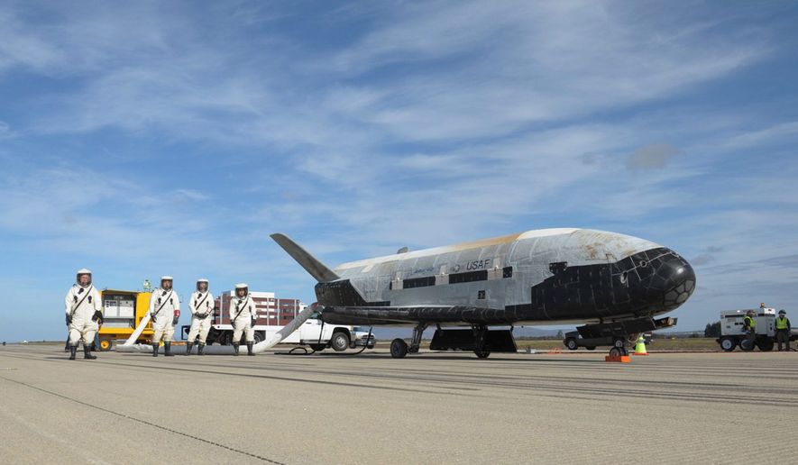The Air Force X-37B Orbital Test Vehicle, a space drone that has flown clandestine missions since 2010, has captured the attention of the UFO community. (Associated Press/File)