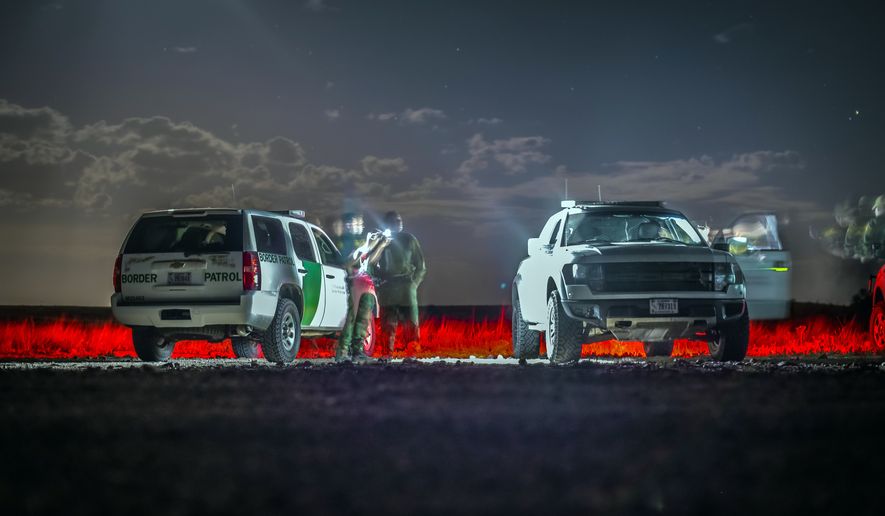 FILE - In this June 23, 2015, file photo, Border Patrol agents wait for other units in the Animas Valley in New Mexico's boot heel area. A 7-year-old Guatemalan girl, picked up with her father and dozens of other migrants along the remote stretch of the U.S.-Mexico border, has died, federal officials said Friday, Dec. 14, 2018. (Roberto E. Rosales/The Albuquerque Journal via AP, File)