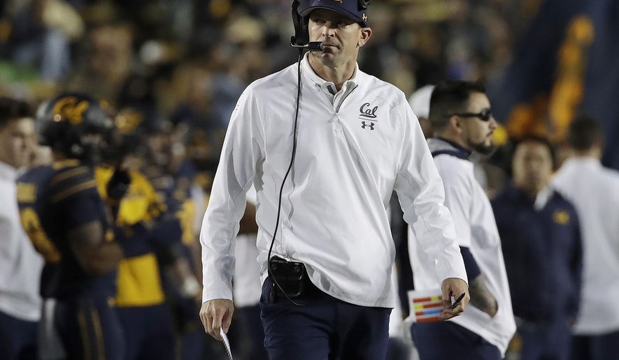 FILE - In this Nov. 24, 2018, file photo, California head coach Justin Wilcox walks on the sideline during the first half of his team's NCAA college football game against Colorado in Berkeley, Calif. California, TCU looking to close out 2018 season on a high note at Cheez-It Bowl on Dec. 26, after struggling to gain bowl eligibility. Cal is looking for its first bowl win in its second season under coach Wilcox after becoming bowl eligible for the first time since 2015. (AP Photo/Jeff Chiu, File)