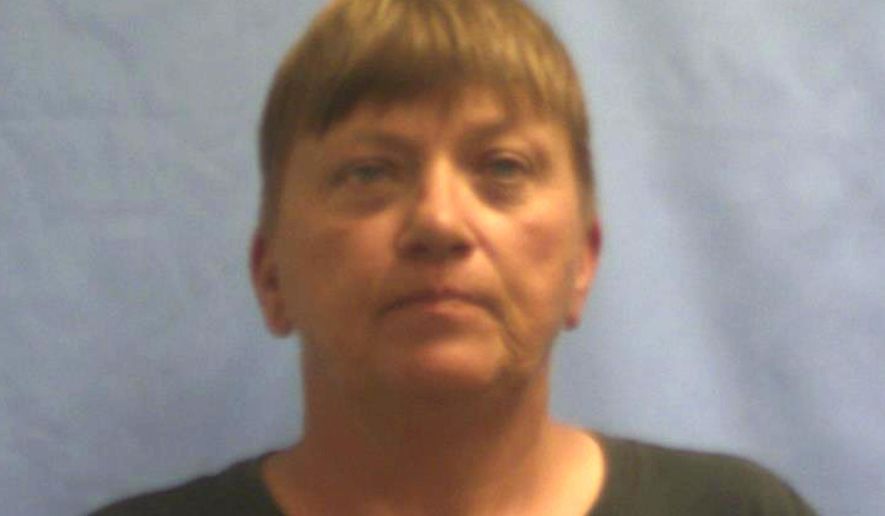 This undated photo provided by the Crawford County Jail in Van Buren, Ark., shows Kimberly Younger. An Arkansas judge has dismissed local charges against four carnival workers including Younger, suspected in the deaths of a retired couple in Kansas. (Crawford County Jail via AP)