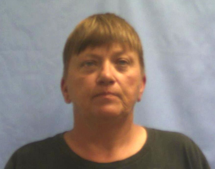 This undated photo provided by the Crawford County Jail in Van Buren, Ark., shows Kimberly Younger. An Arkansas judge has dismissed local charges against four carnival workers including Younger, suspected in the deaths of a retired couple in Kansas. (Crawford County Jail via AP)