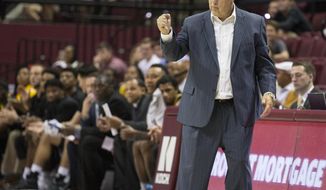 File-This Dec. 21, 2017, file photo shows  Southern Miss head coach Doc Sadler pumping his fist after a score in the first half of an NCAA college basketball game against Florida State in Tallahassee, Fla. Frustrated mid-major conference officials are taking drastic action they hope will nudge the selection pendulum in their direction when it comes to NCAA Tournament at-large invitations and seeding. Leading the way is Conference USA, which has dumped a conventional league schedule in favor of a revolutionary one based on results. C-USA’s 14 teams won’t know who they’ll be playing during the final two weeks of the regular season until mid-February, when the standings will determine the final matchups. The move is to ensure the league’s best teams are playing each other in hopes of improving their tournament profiles. (AP Photo/Mark Wallheiser, File)