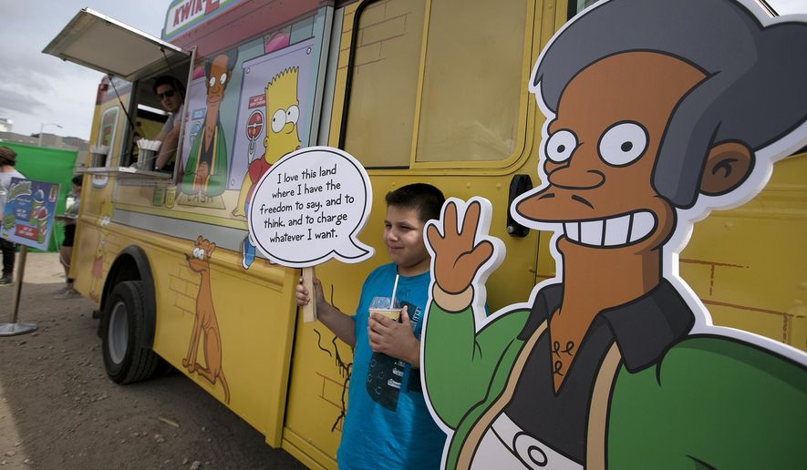 In this March 15, 2015, photo, an Apu cutout is displayed at a Simpsons Kwik-E-Mart Truck in Austin, Texas. Comedian Hari Kondabolu released a film, “The Problem With Apu,” documenting stereotypes he saw with the character and its effect on South Asian entertainers. (Deborah Cannon/Austin American-Statesman via AP) **FILE**