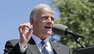 Evangelist Franklin Graham speaks during a mass prayer rally on Boston Common, Tuesday, Aug. 30, 2016, in Boston as part of a tour to urge evangelicals to vote. (AP Photo/Elise Amendola) 