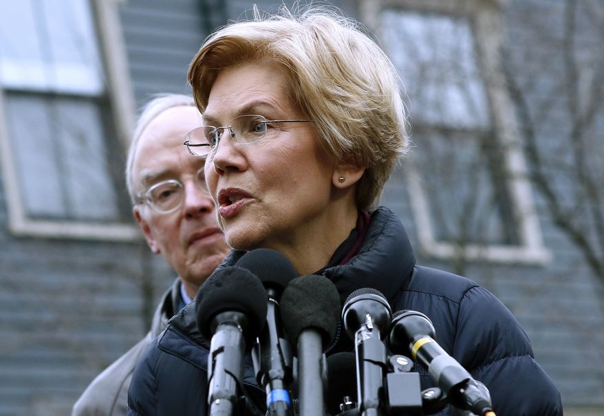 Sen. Elizabeth Warren, D-Mass., speaks beside her husband Bruce Mann, left, outside their home, Monday, Dec. 31, 2018, in Cambridge, Mass., where she confirmed that she is launching an exploratory committee to run for president. Warren on Monday took the first major step toward launching a widely anticipated campaign for the presidency, hoping her reputation as a populist fighter can help her navigate a Democratic field that could include nearly two dozen candidates. (AP Photo/Bill Sikes) ** FILE **